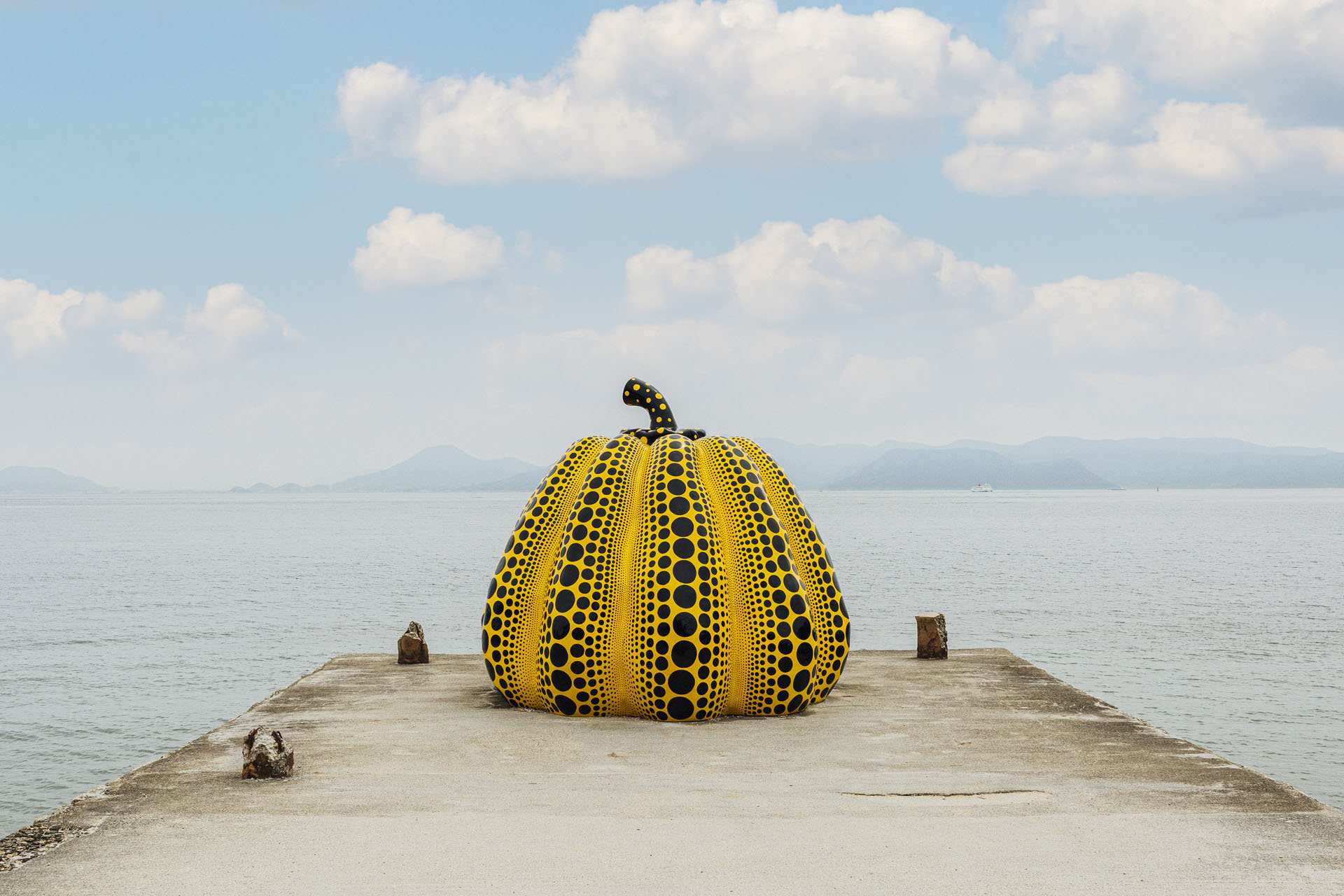 pumpkin sculpture by yayoi kusama in naoshima japan
